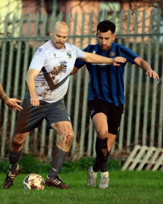 James Russell in action for The Swifts against Hakin recently, bagged a superb hat-trick at Carew.